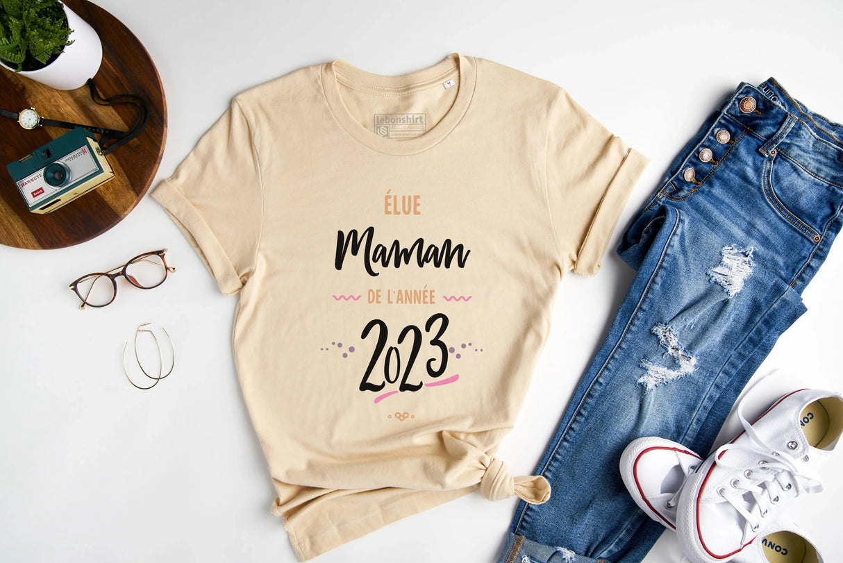 Lebonshirt® T-shirt Femme Coton Bio - Élue Maman De L'année 2023, Idée Cadeau Original Fête Des Mères - L130522S21 Naturel