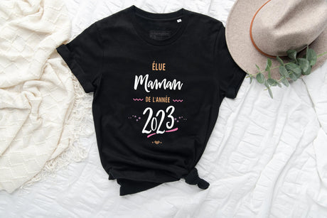 Lebonshirt® T-shirt Femme Coton Bio - Élue Maman De L'année 2023, Idée Cadeau Original Fête Des Mères - L130522S21 Noir